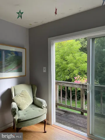 a view of a livingroom with furniture and window