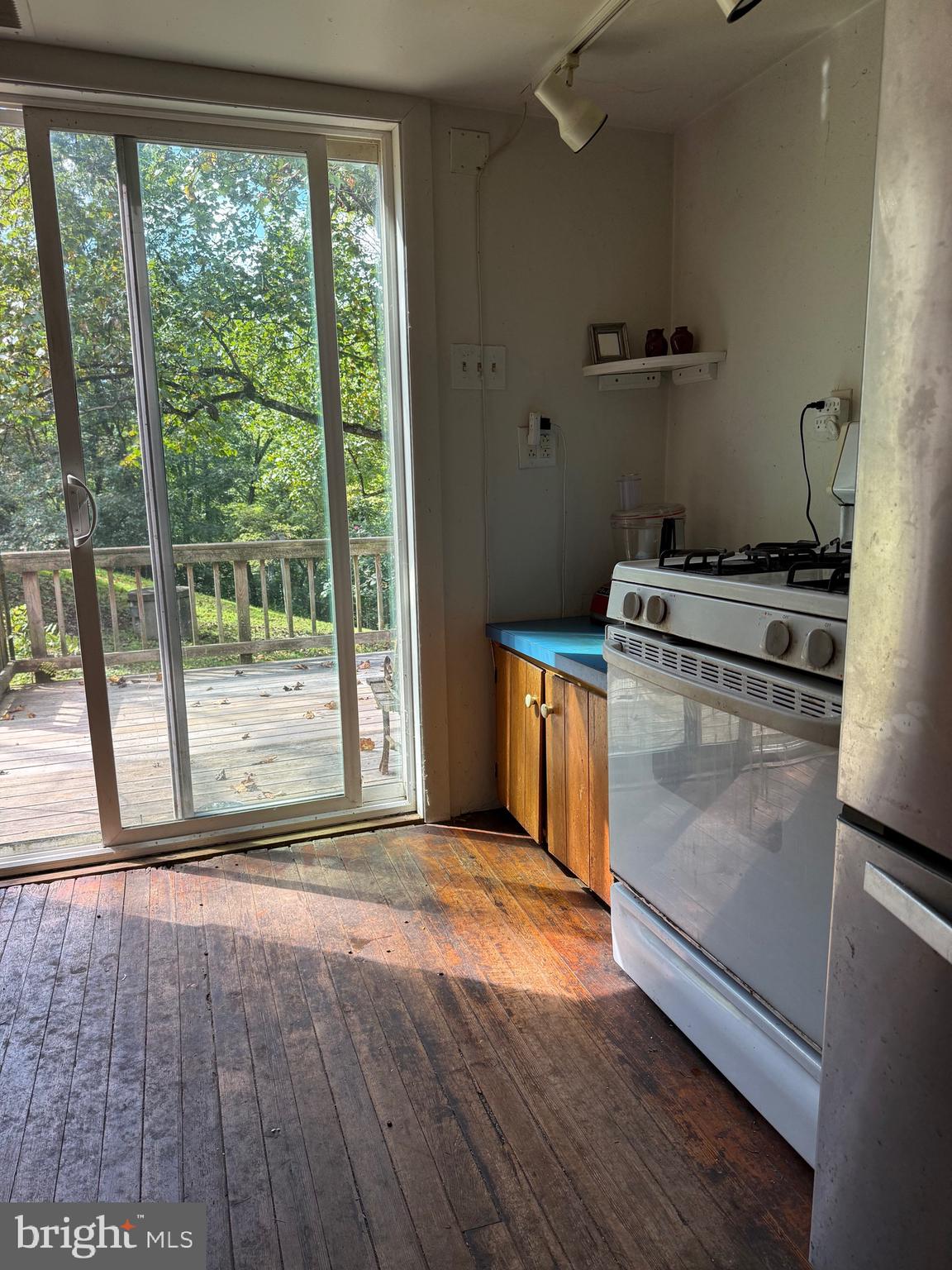 236 Piedmont Orchard Road Linden, VA 22642 - Photo 18 of 39 a kitchen with wooden floors and a stove
