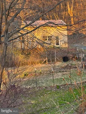 a view of a pathway of a house with a large window