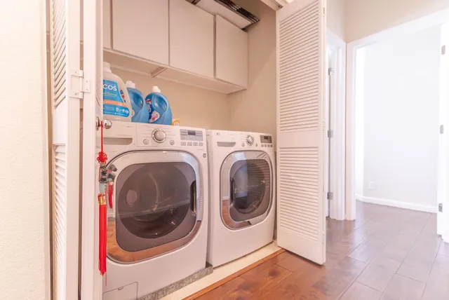 a utility room with dryer and washer