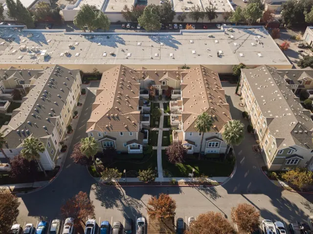 an aerial view of a building with outdoor space