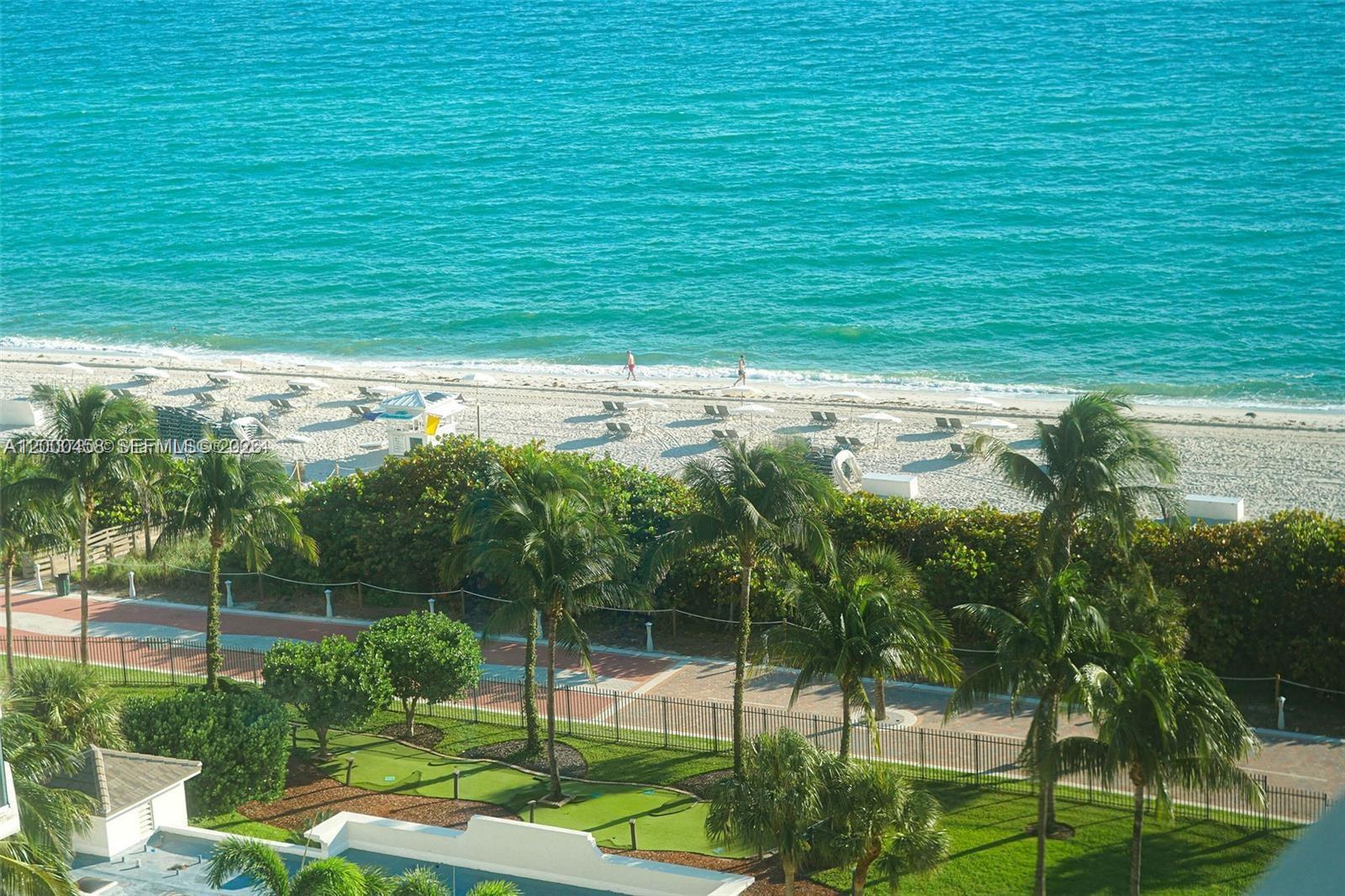 4747 Collins Avenue, Unit 1108 Miami Beach, FL 33140 - Photo 8 of 17 a view of a backyard