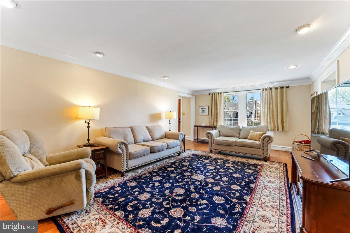 132 North Highland Road Springfield, PA 19064 - Photo 15 of 35 a living room with furniture and a couch
