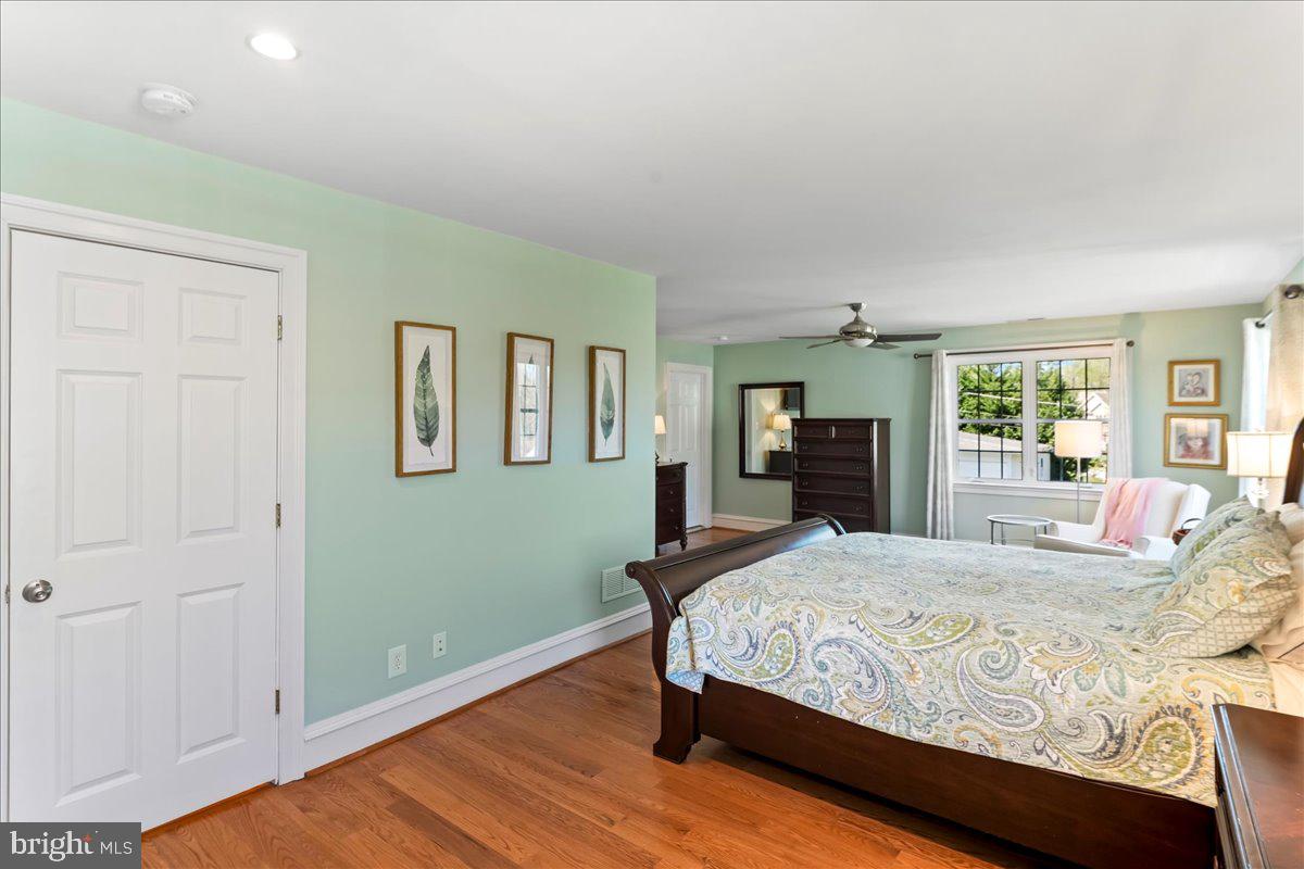 132 North Highland Road Springfield, PA 19064 - Photo 27 of 35 a bedroom with a bed and a dresser