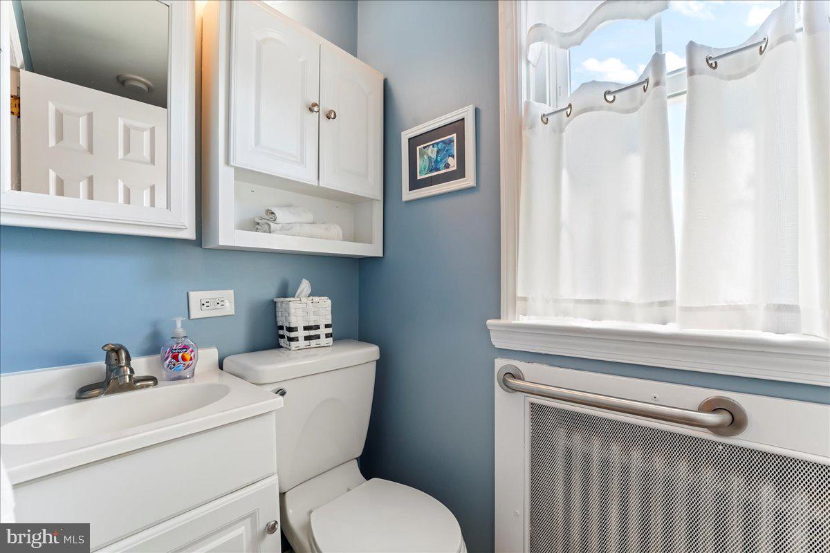 132 North Highland Road Springfield, PA 19064 - Photo 29 of 35 a bathroom with a sink a toilet and a window