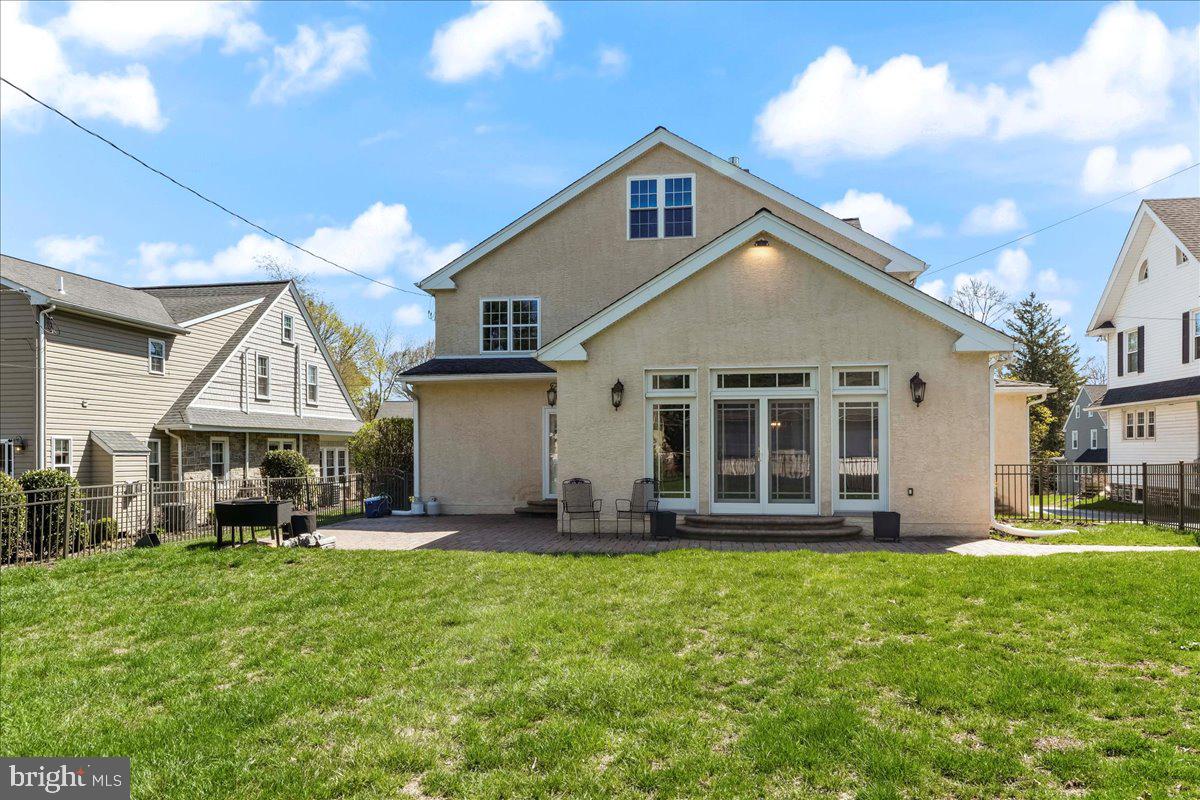 132 North Highland Road Springfield, PA 19064 - Photo 33 of 35 a front view of a house with a yard table and chairs