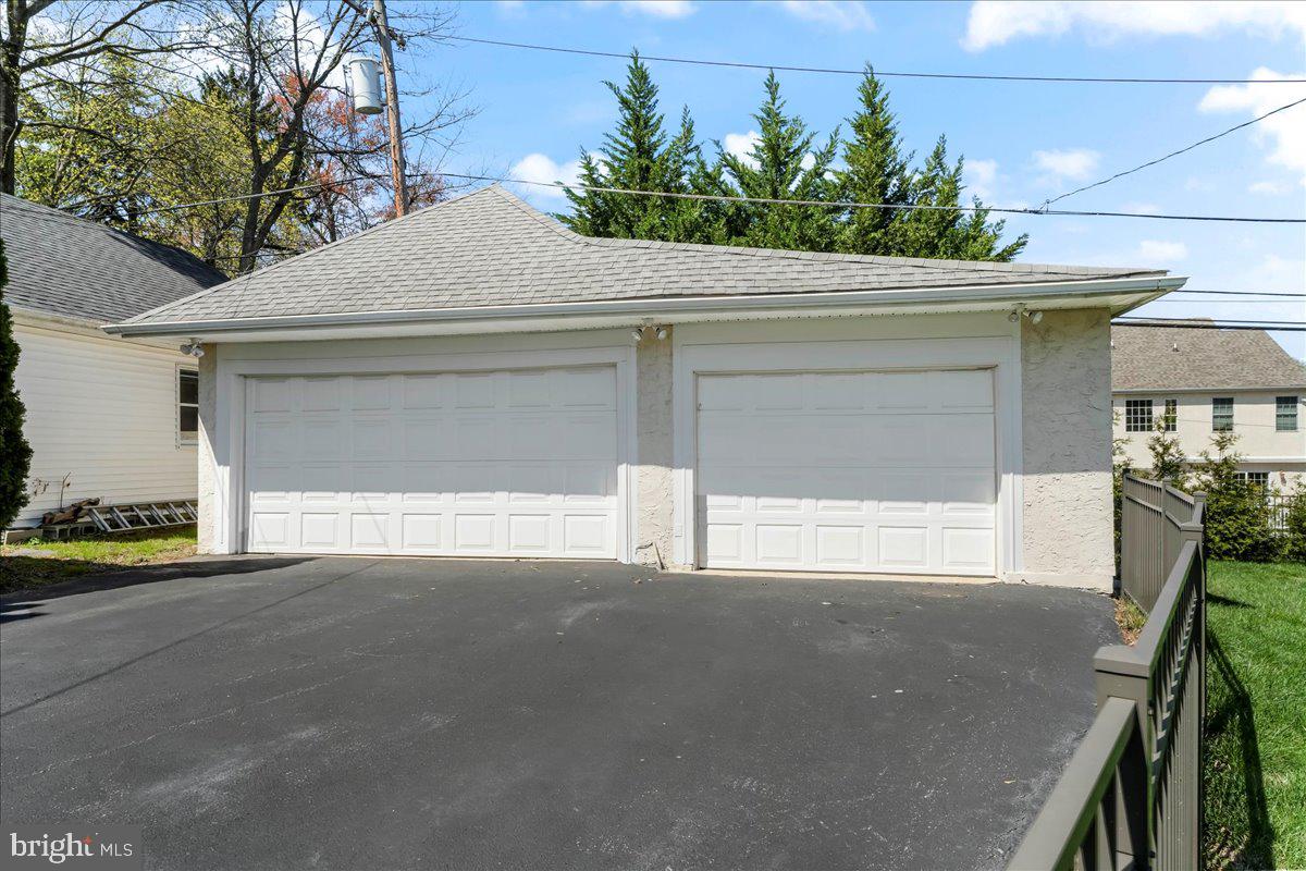 132 North Highland Road Springfield, PA 19064 - Photo 35 of 35 a front view of a house with a garage