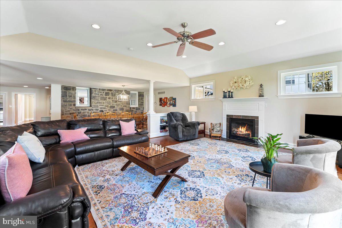132 North Highland Road Springfield, PA 19064 - Photo 5 of 35 a living room with furniture a fireplace and a window