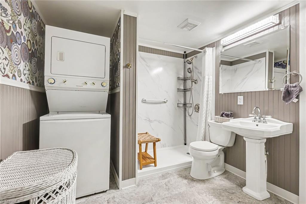 5883 Mendenhall Road Archdale, NC 27263 - Photo 12 of 28 Bathroom with low step shower