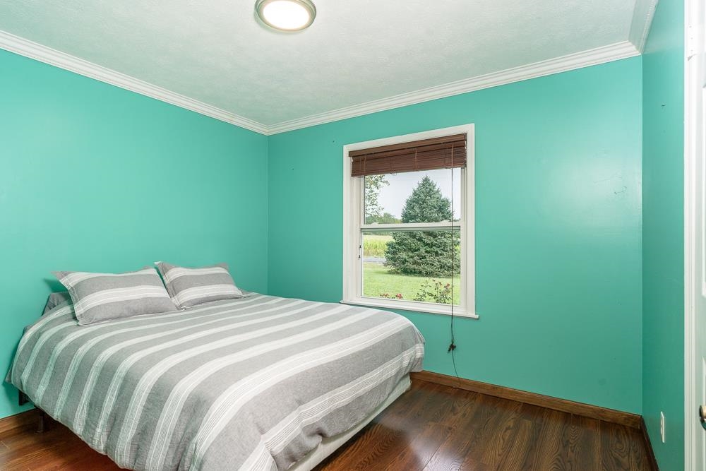 7812 Windy Cove Road Bridgewater, VA 22812 - Photo 11 of 41 a bedroom with a bed and a window