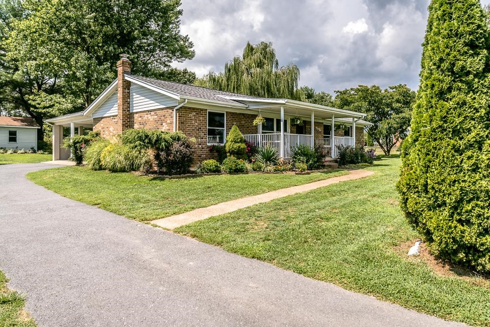 7812 Windy Cove Road Bridgewater, VA 22812 - Photo 15 of 41 a front view of house with yard and green space
