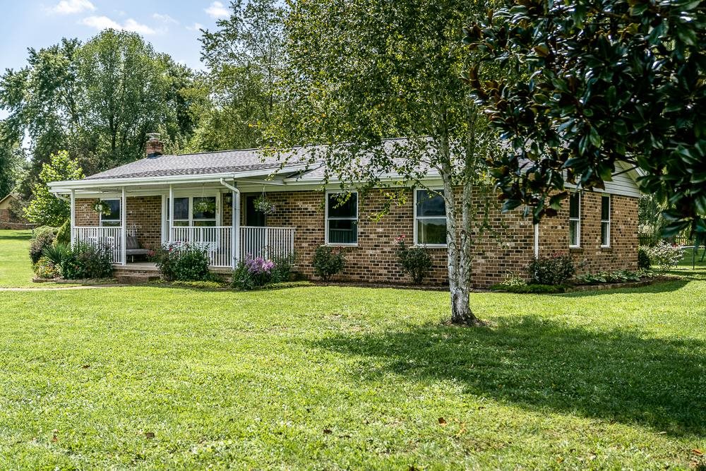 7812 Windy Cove Road Bridgewater, VA 22812 - Photo 18 of 41 a view of a house with a backyard