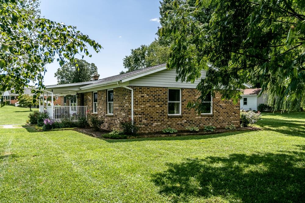 7812 Windy Cove Road Bridgewater, VA 22812 - Photo 19 of 41 a view of a house with a yard and sitting area
