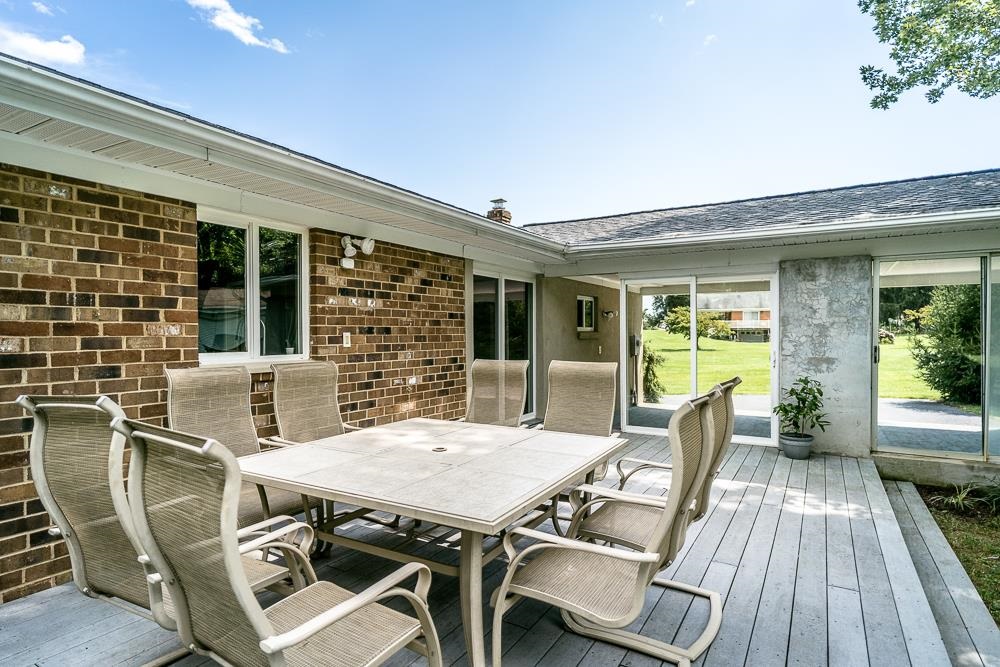 7812 Windy Cove Road Bridgewater, VA 22812 - Photo 23 of 41 a view of a patio with table and chairs