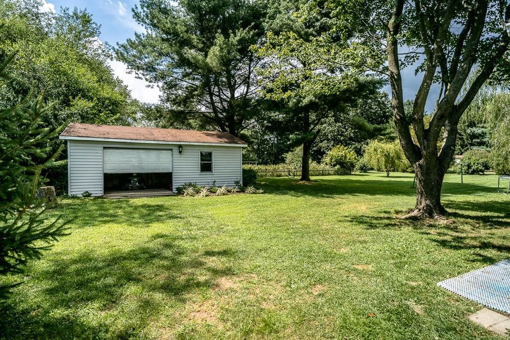 7812 Windy Cove Road Bridgewater, VA 22812 - Photo 31 of 41 a front view of a house with a garden