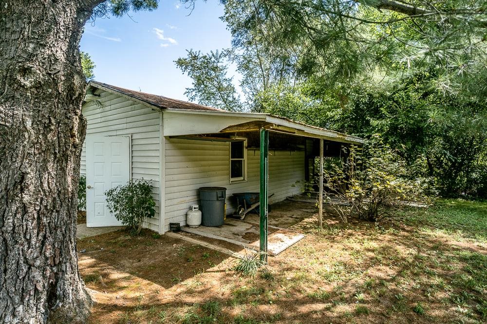 7812 Windy Cove Road Bridgewater, VA 22812 - Photo 37 of 41 a backyard of a house with table and chairs
