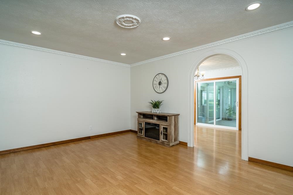 7812 Windy Cove Road Bridgewater, VA 22812 - Photo 4 of 41 an empty room with wooden floor and windows