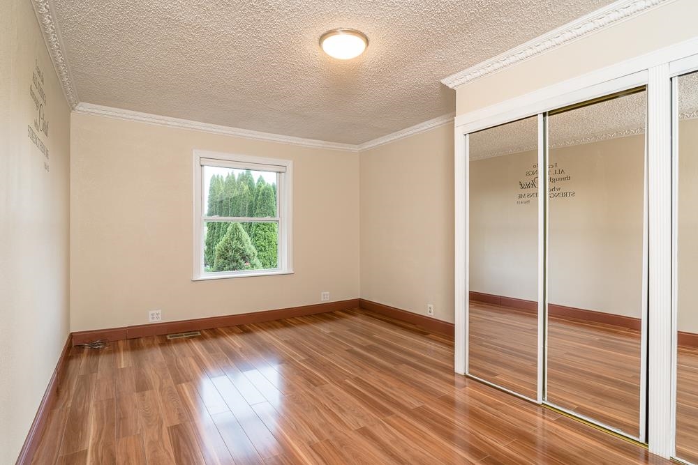 7812 Windy Cove Road Bridgewater, VA 22812 - Photo 9 of 41 a view of an empty room with wooden floor and a window