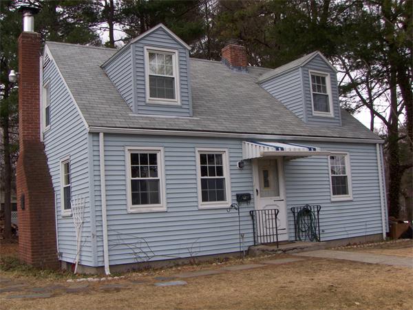 a front view of a house with a garage