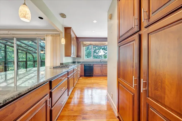 a balcony with trees in front of it