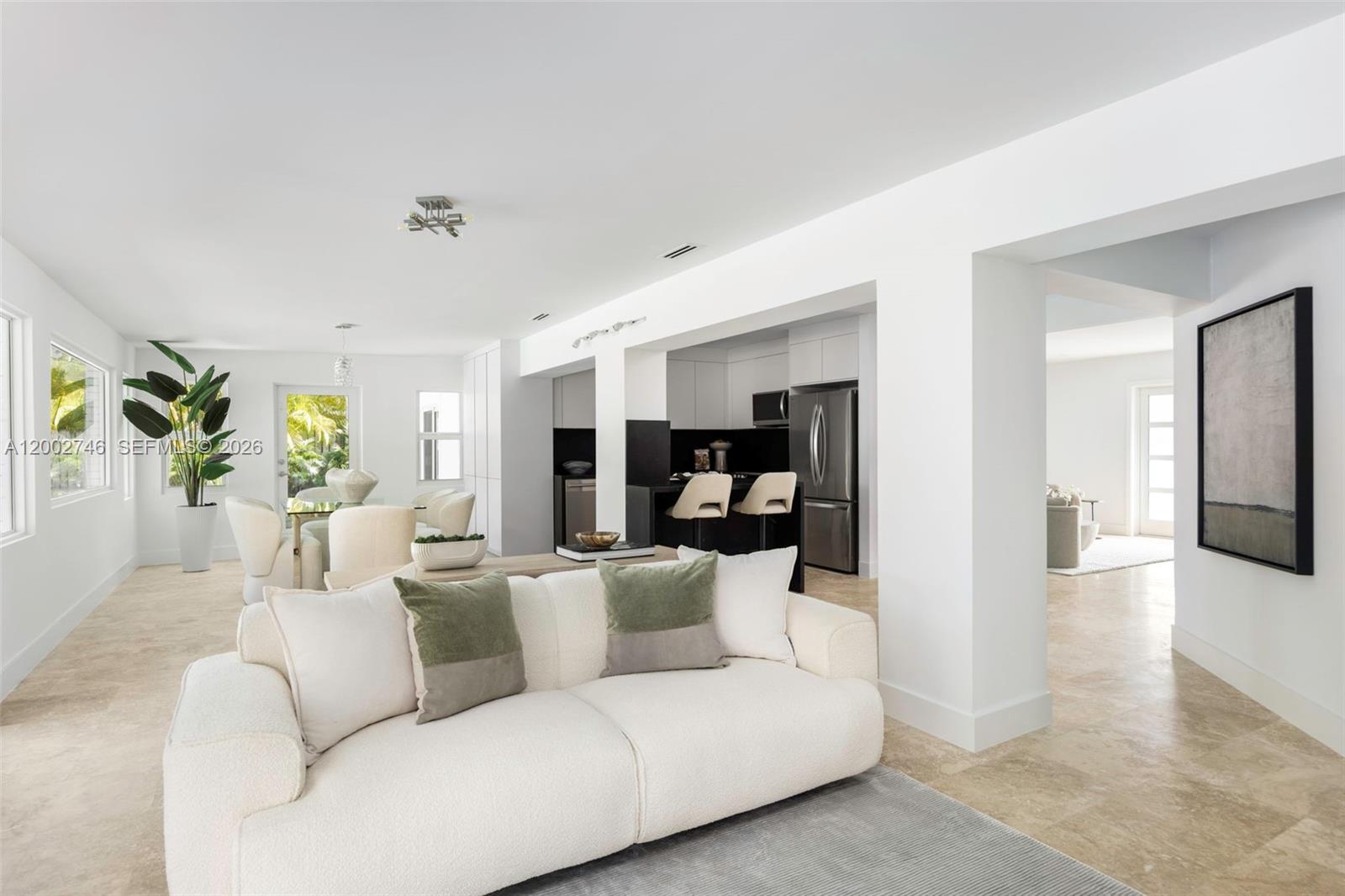 255 Ridgewood Road Key Biscayne, FL 33149 - Photo 10 of 30 a living room with furniture white wooden floor and a rug