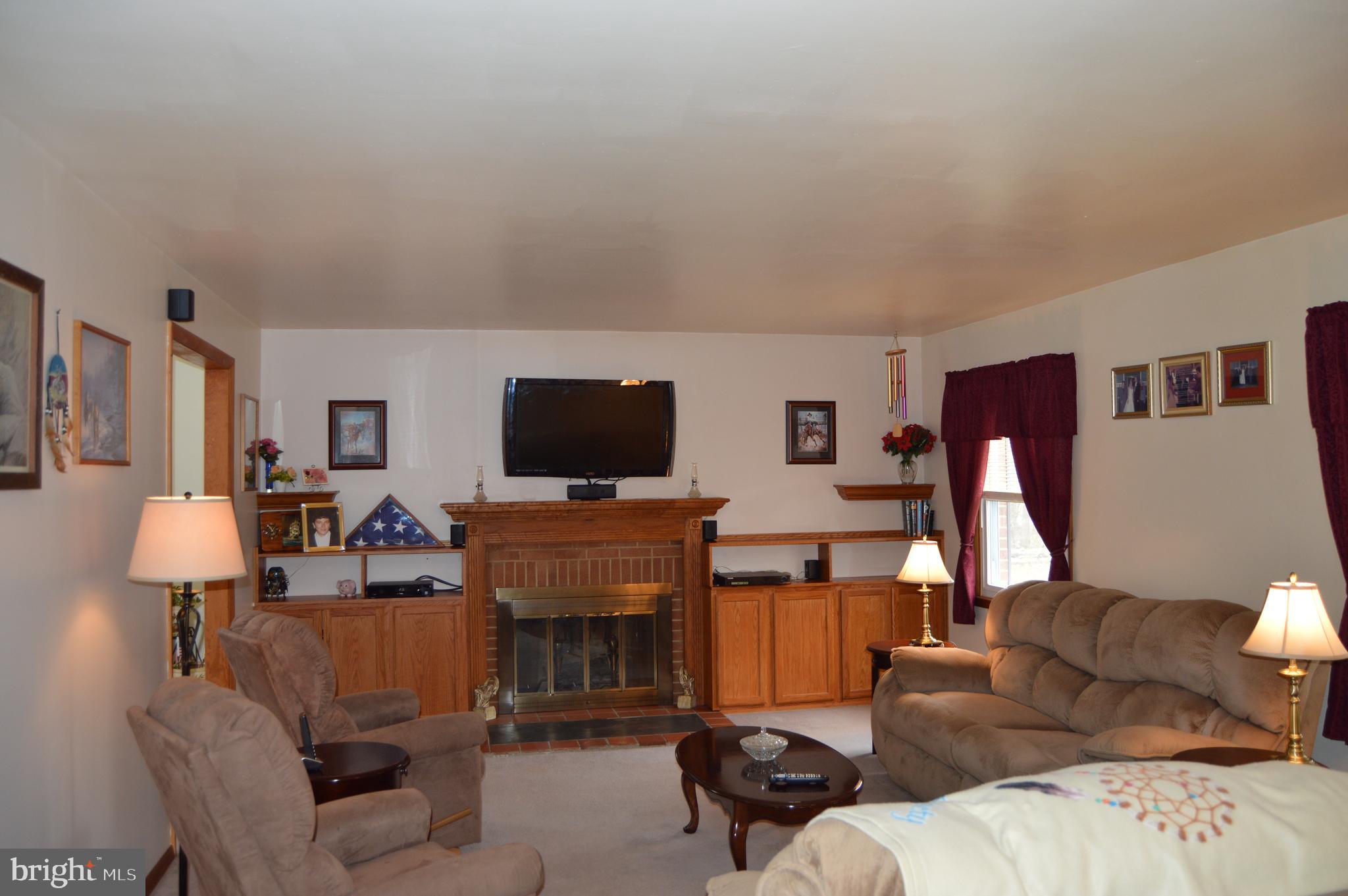 8315 Jacobs Road Severn, MD 21144 - Photo 14 of 37 Cozy Living Room with a Fire Place