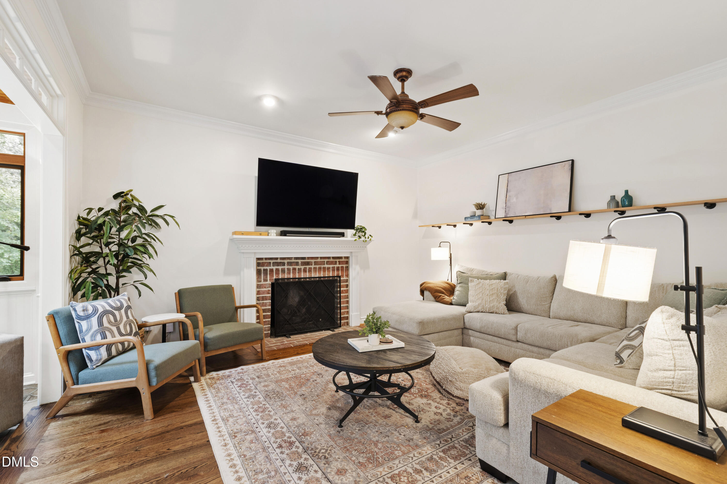 7501 Panther Branch Drive Raleigh, NC 27612 - Photo 12 of 56 a living room with furniture and a fireplace