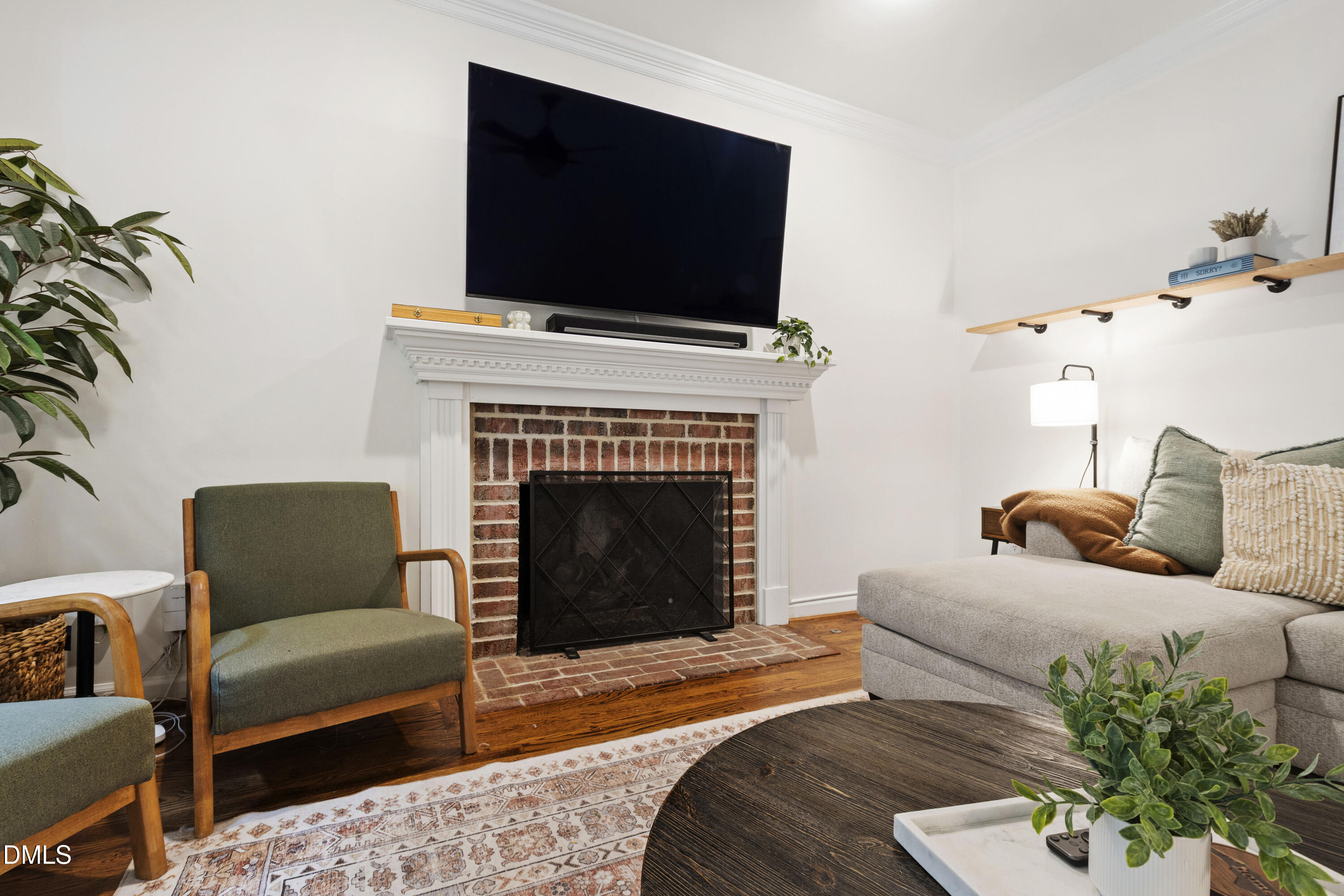 7501 Panther Branch Drive Raleigh, NC 27612 - Photo 13 of 56 a living room with furniture and a fireplace
