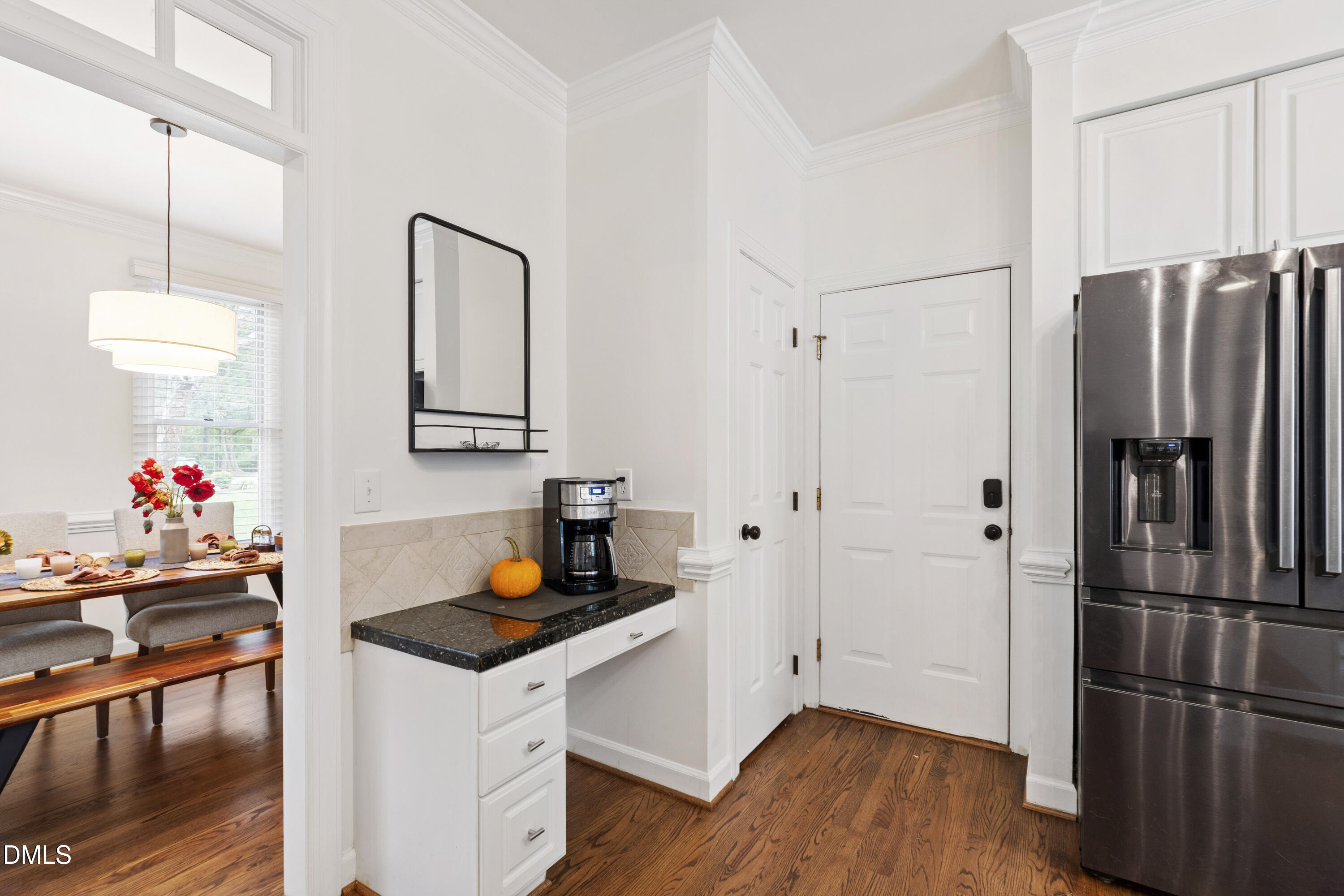 7501 Panther Branch Drive Raleigh, NC 27612 - Photo 23 of 56 a kitchen with stainless steel appliances granite countertop a refrigerator and a sink