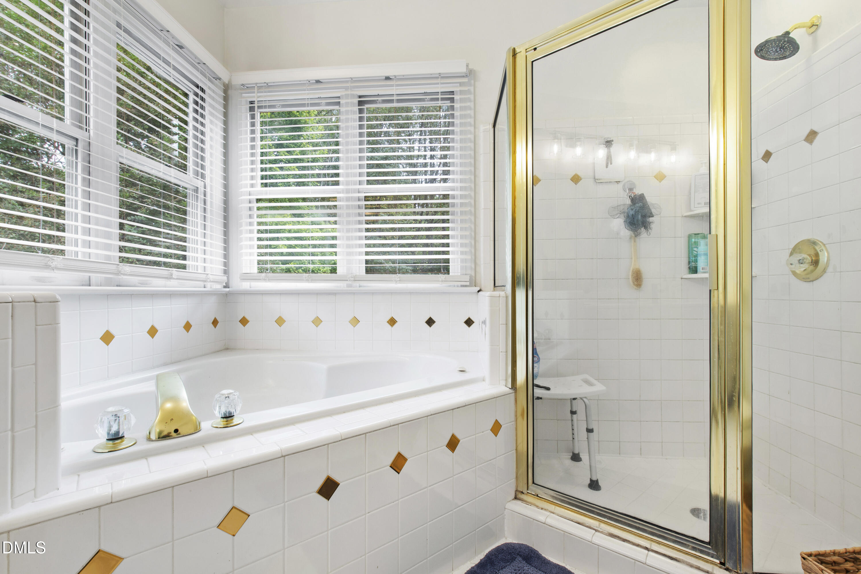 7501 Panther Branch Drive Raleigh, NC 27612 - Photo 32 of 56 a bathroom with a bathtub and a shower