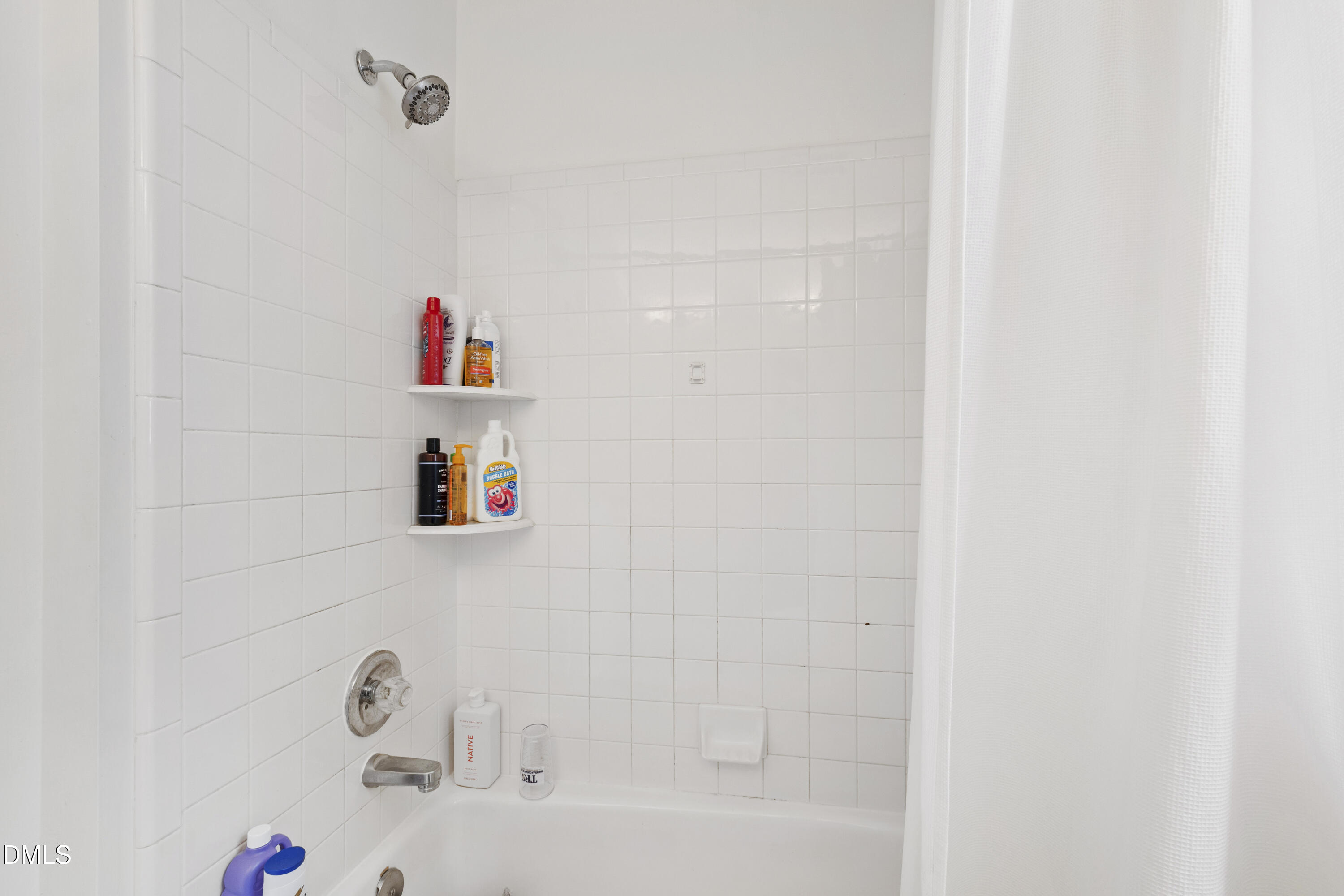 7501 Panther Branch Drive Raleigh, NC 27612 - Photo 36 of 56 a bathroom with a bathtub and a shower