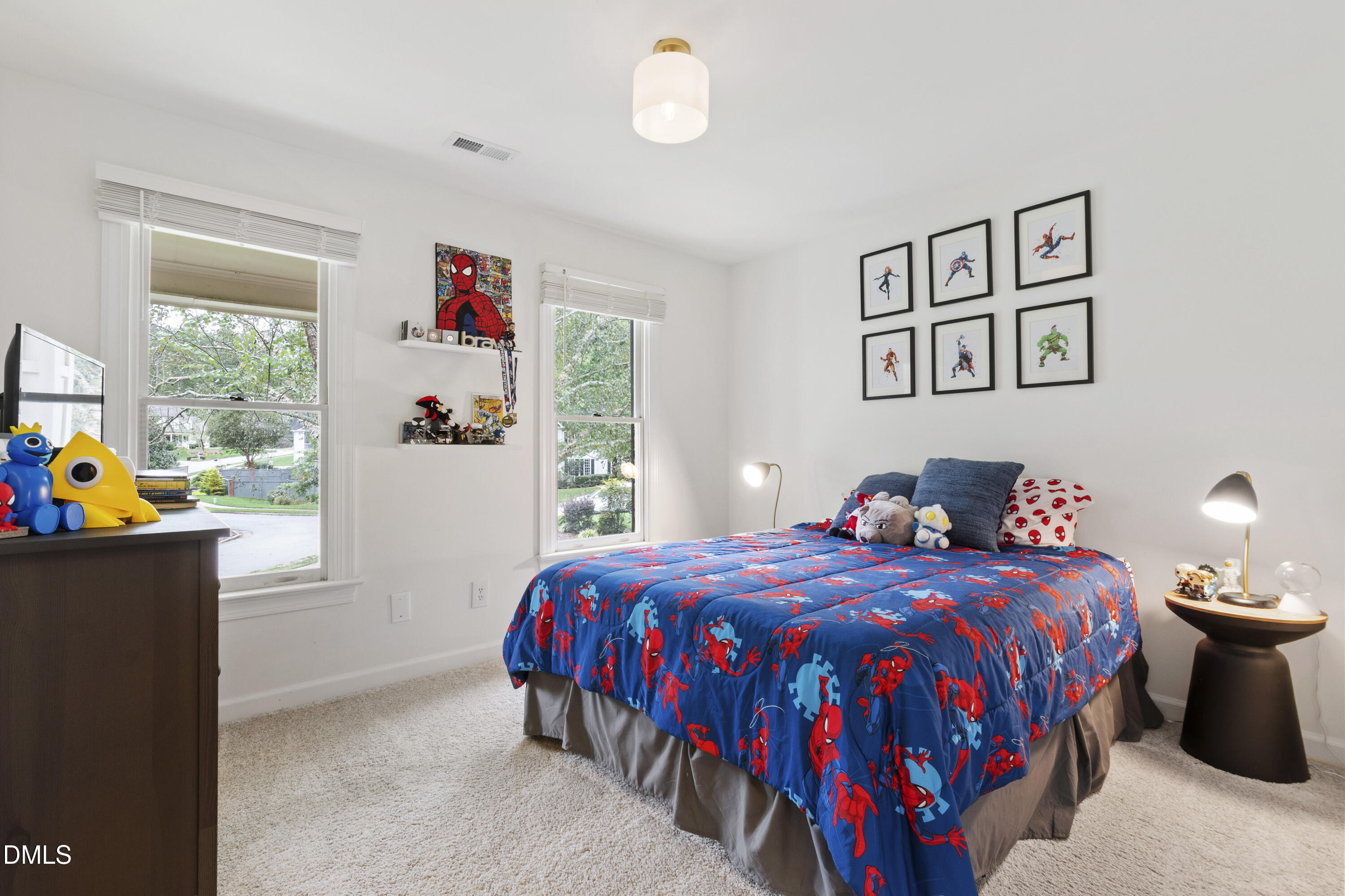 7501 Panther Branch Drive Raleigh, NC 27612 - Photo 37 of 56 a bedroom with a bed and window