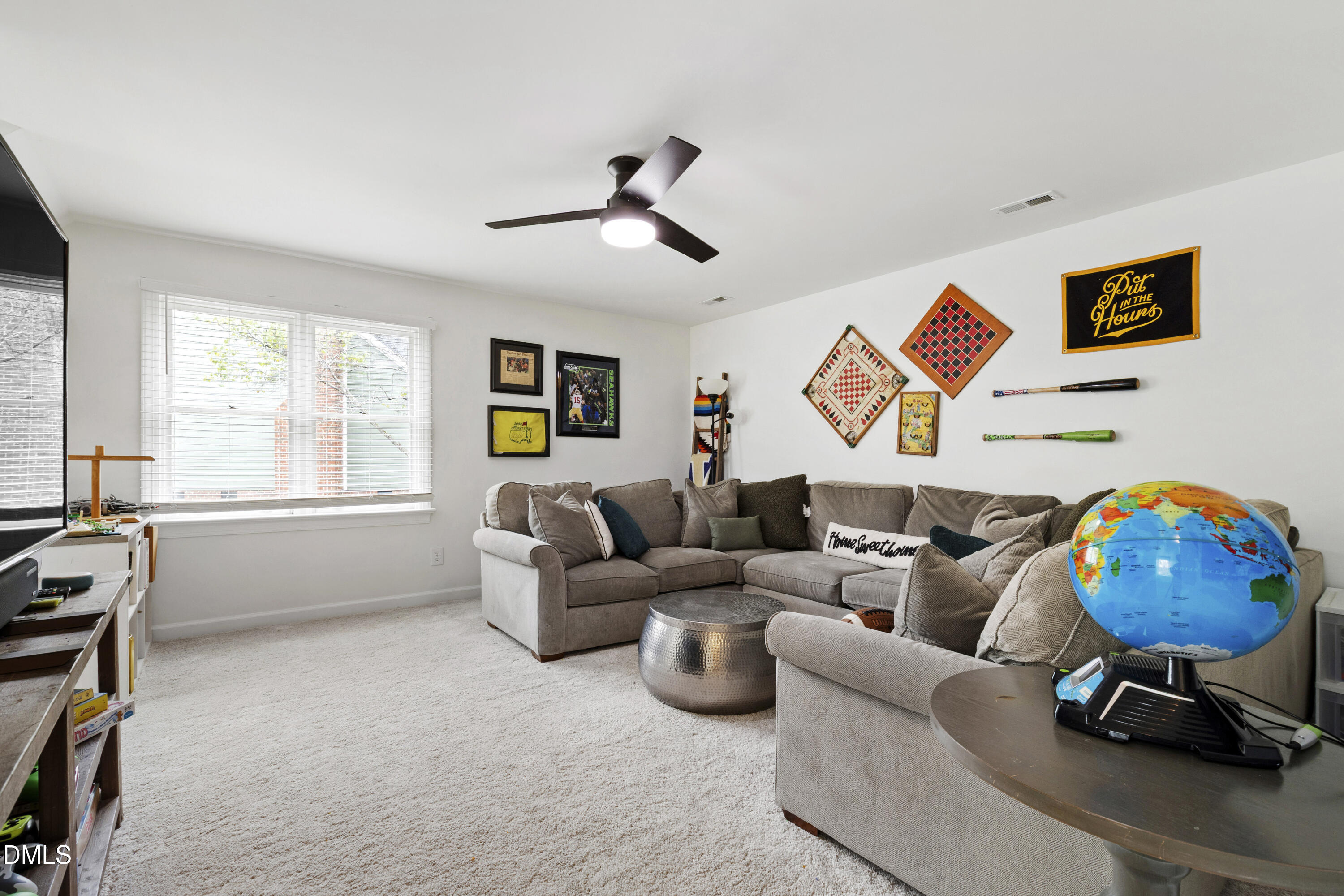 7501 Panther Branch Drive Raleigh, NC 27612 - Photo 41 of 56 a living room with furniture and a window