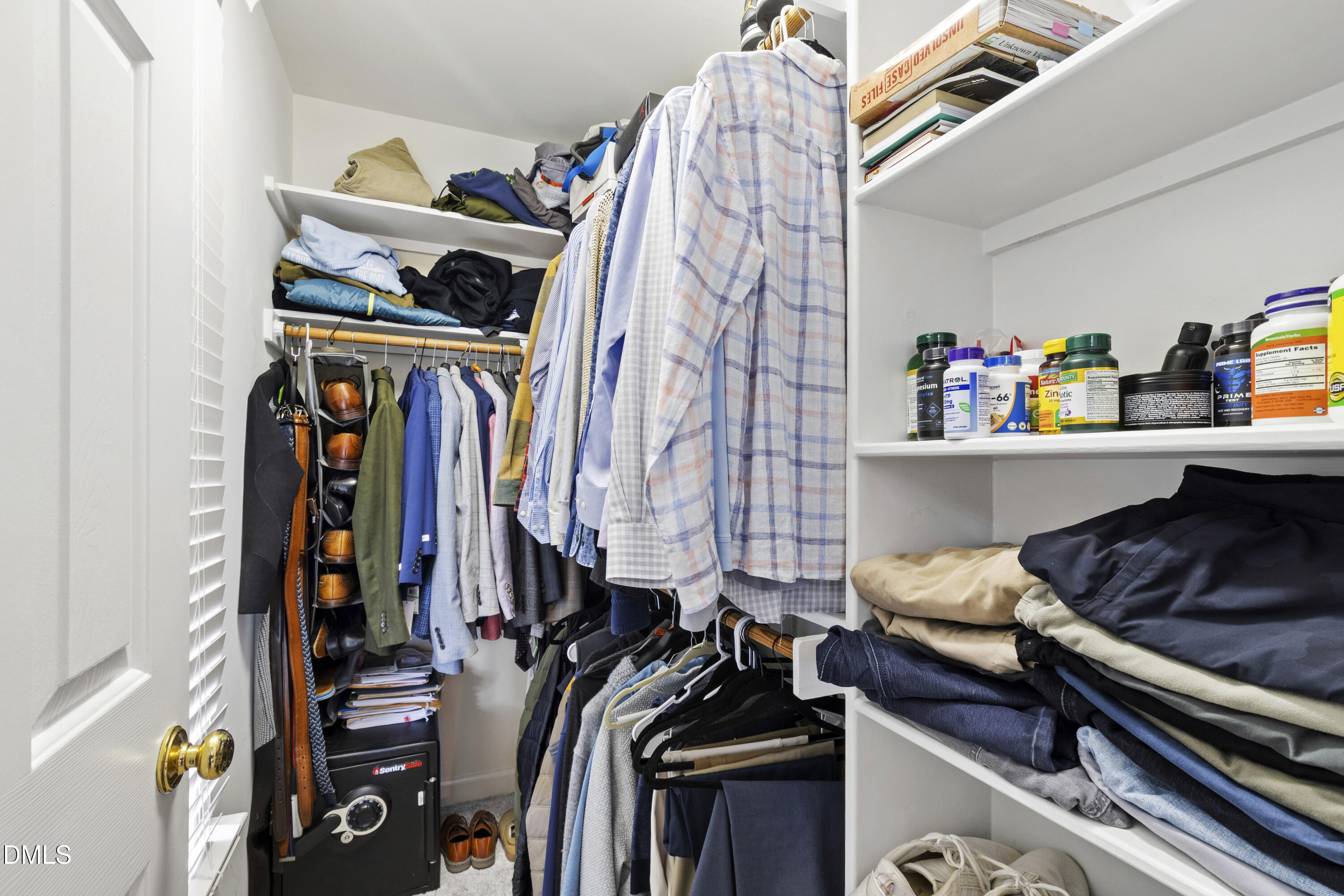 7501 Panther Branch Drive Raleigh, NC 27612 - Photo 43 of 56 a view of walk in closet with clothes and shoes