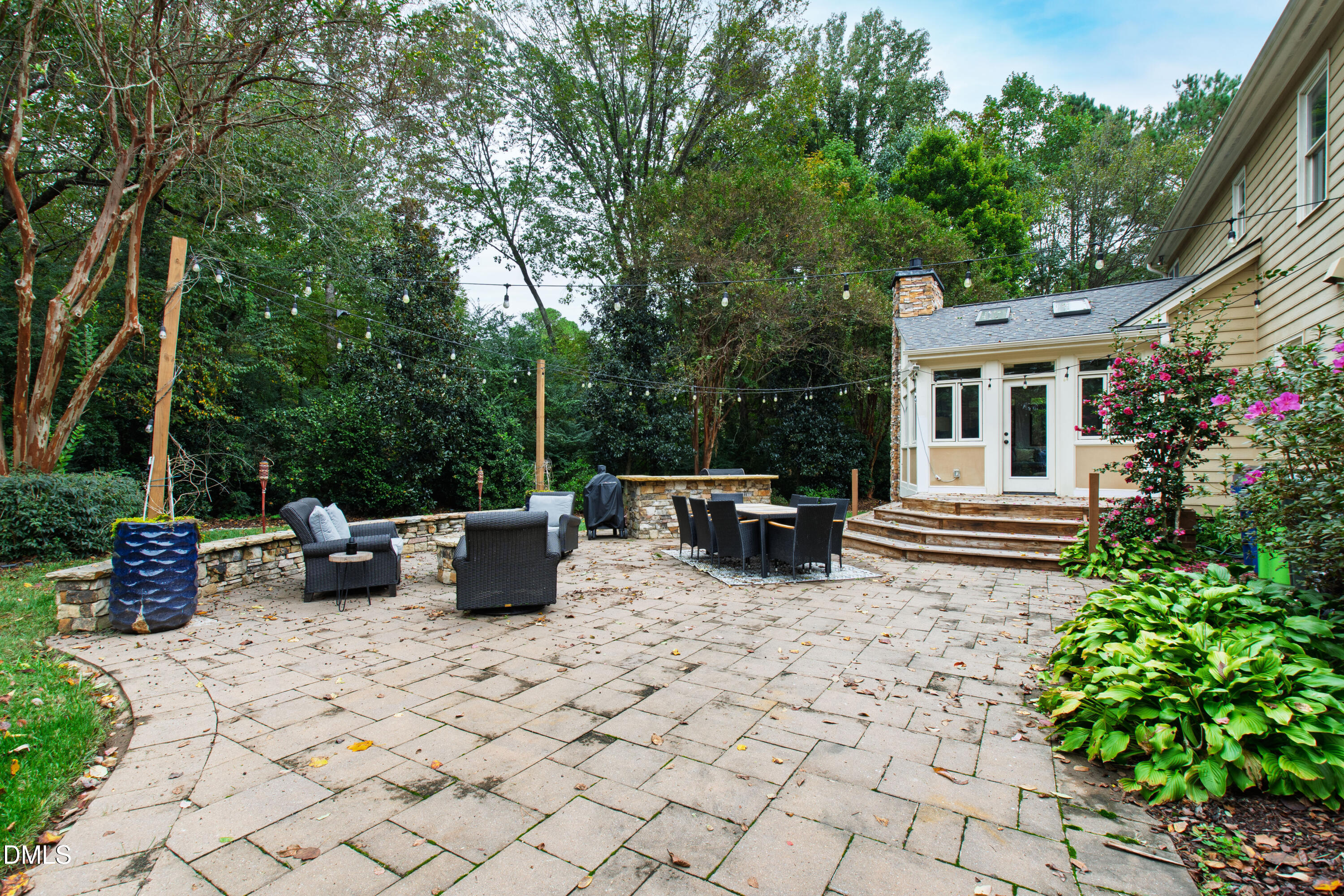 7501 Panther Branch Drive Raleigh, NC 27612 - Photo 44 of 56 a view of a patio with chairs and plants