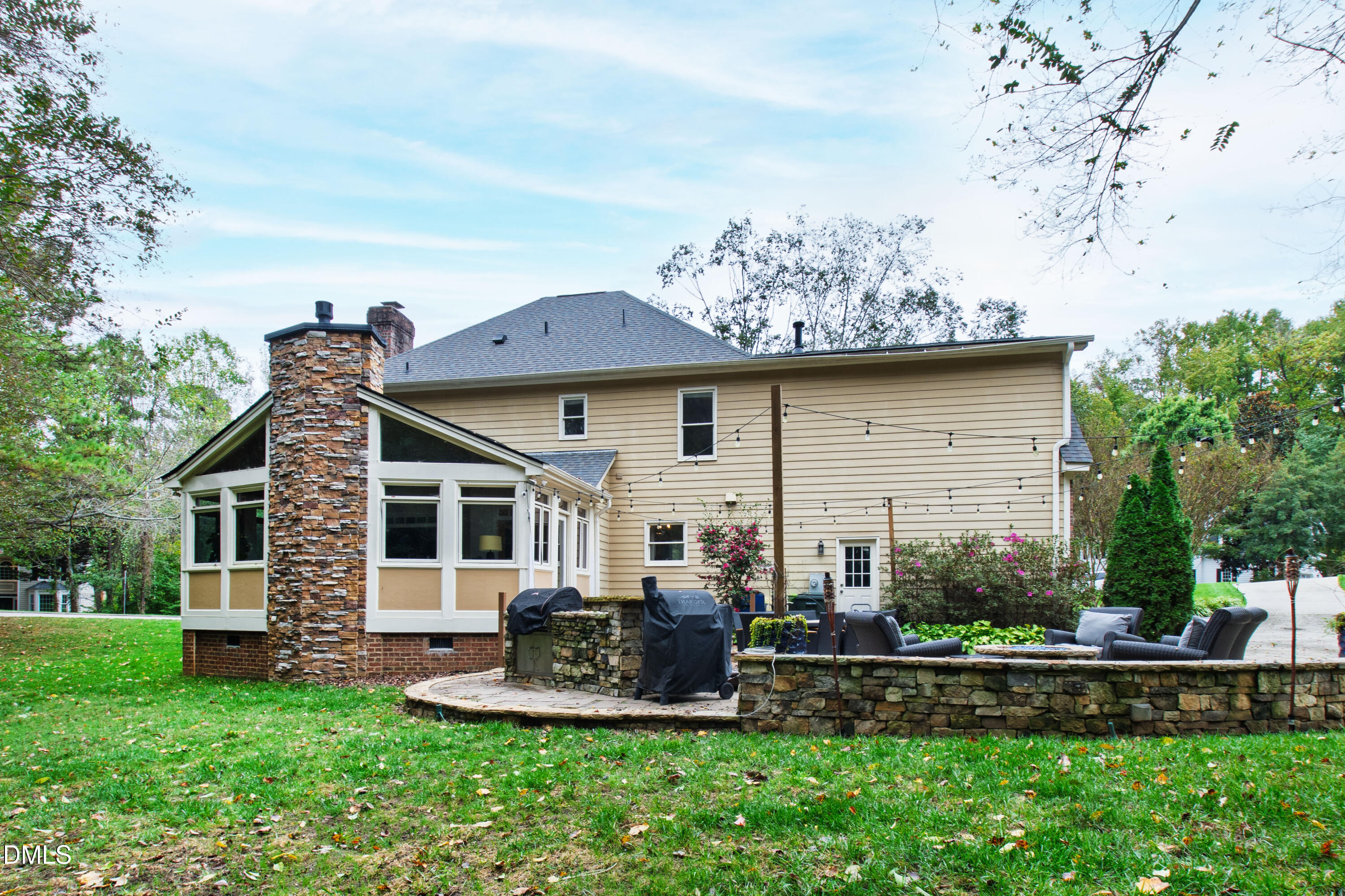 7501 Panther Branch Drive Raleigh, NC 27612 - Photo 47 of 56 a front view of a house with garden