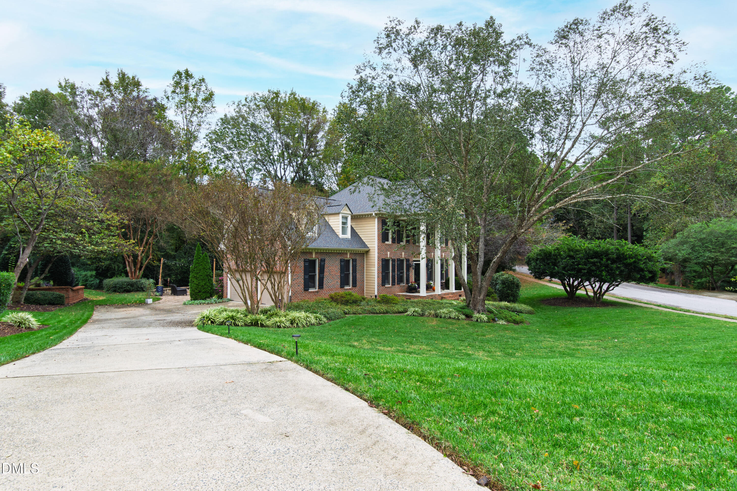 7501 Panther Branch Drive Raleigh, NC 27612 - Photo 50 of 56 front view of a house with a yard
