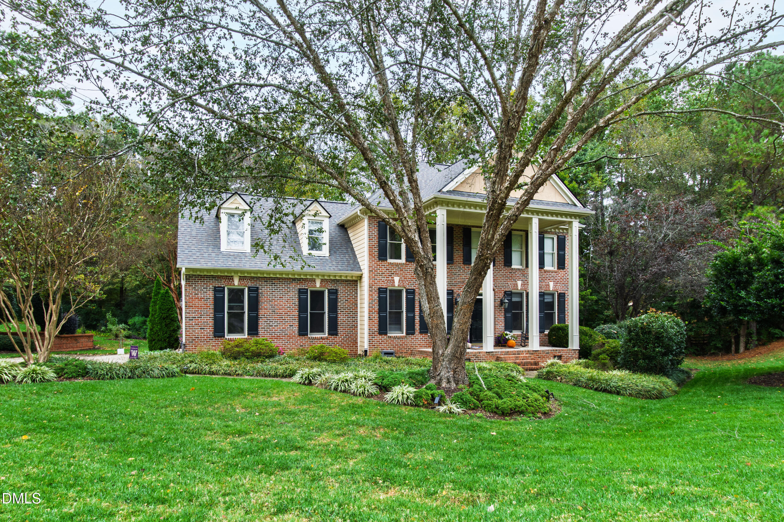 7501 Panther Branch Drive Raleigh, NC 27612 - Photo 53 of 56 front view of a house with a yard