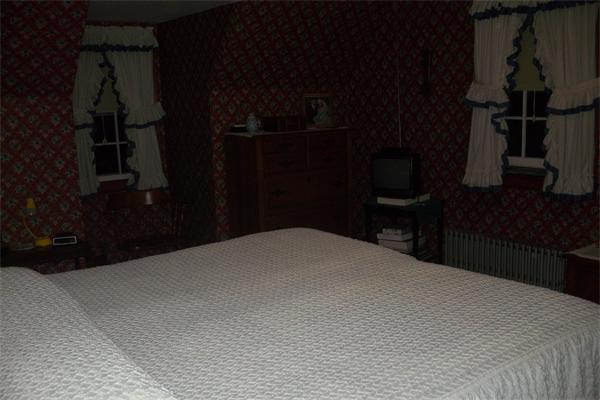 111 Goodwin Street Springfield, MA 01151 - Photo 12 of 19 a bedroom with a bed and a closet
