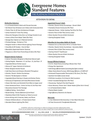 a living room with furniture and a lamp