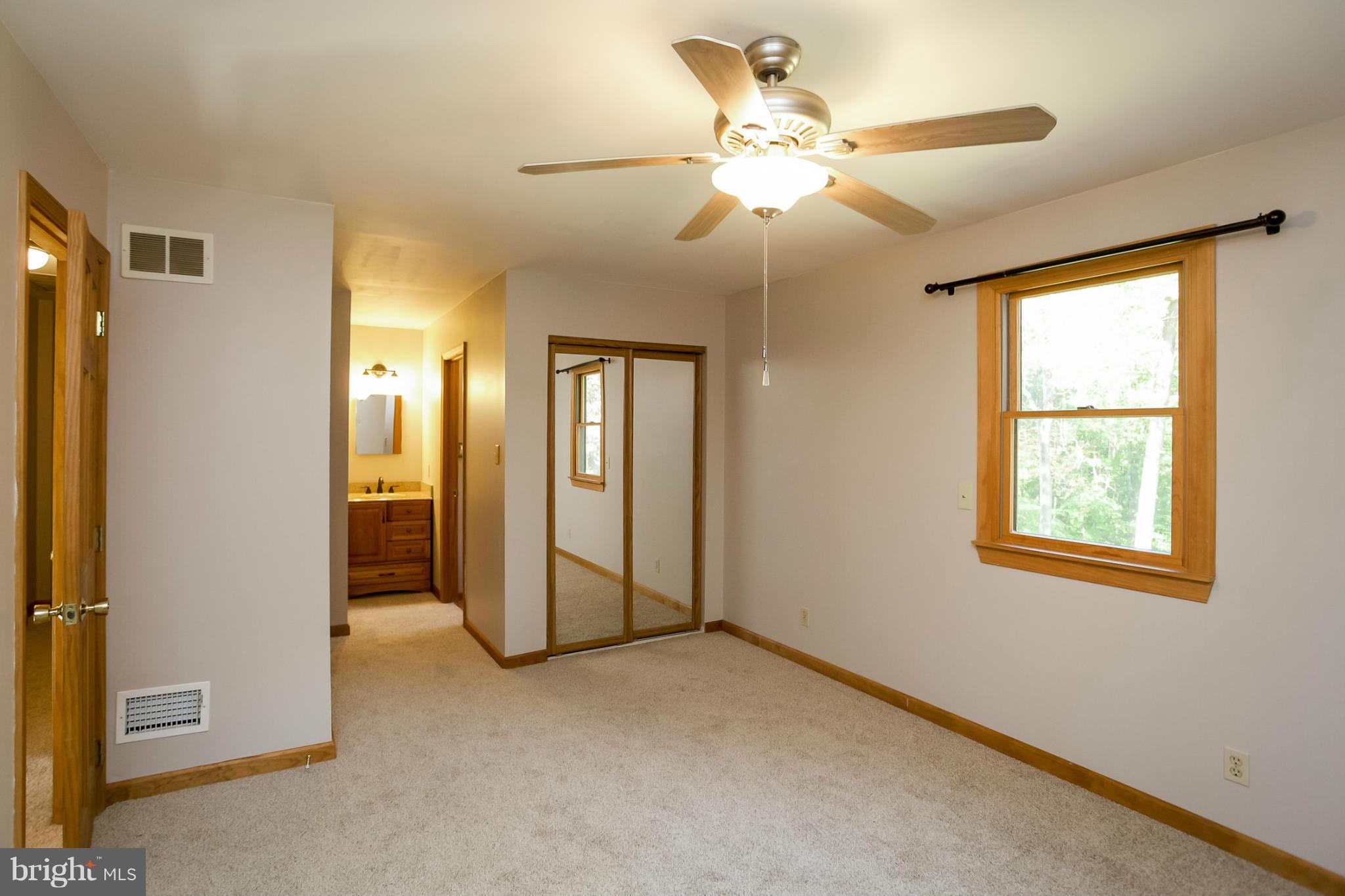 4371 Telegraph Road Elkton, MD 21921 - Photo 22 of 30 a view of a livingroom with a ceiling fan and window