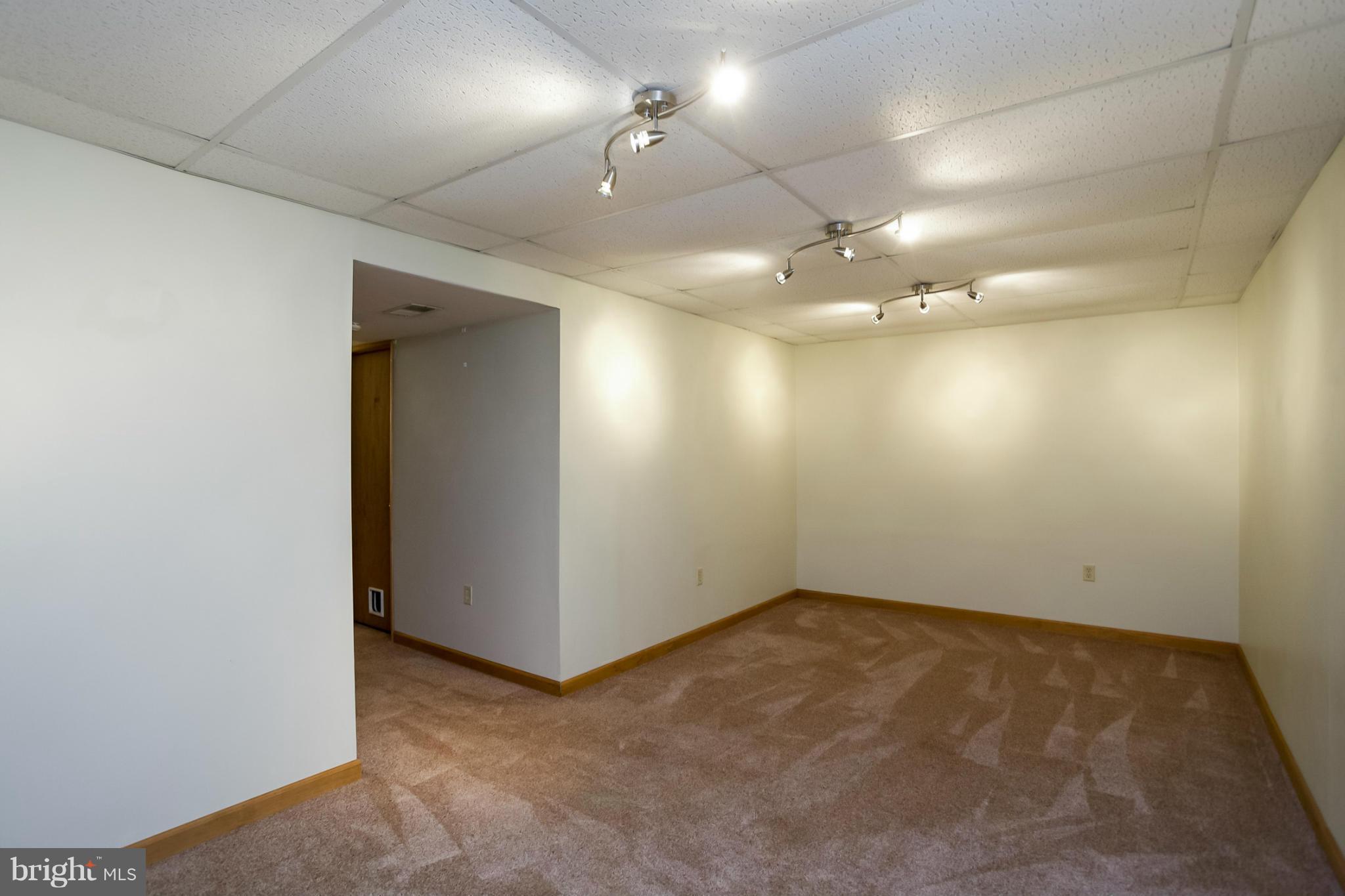 4371 Telegraph Road Elkton, MD 21921 - Photo 24 of 30 an empty room with a empty space and a ceiling fan