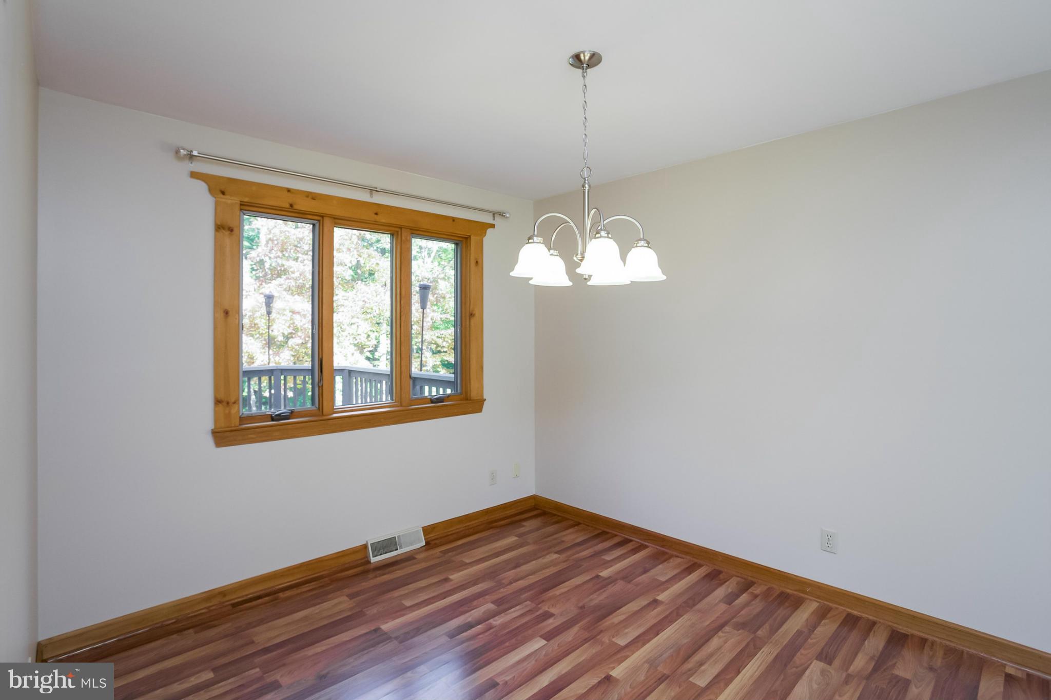 4371 Telegraph Road Elkton, MD 21921 - Photo 6 of 30 a view of empty room with wooden floor and fan