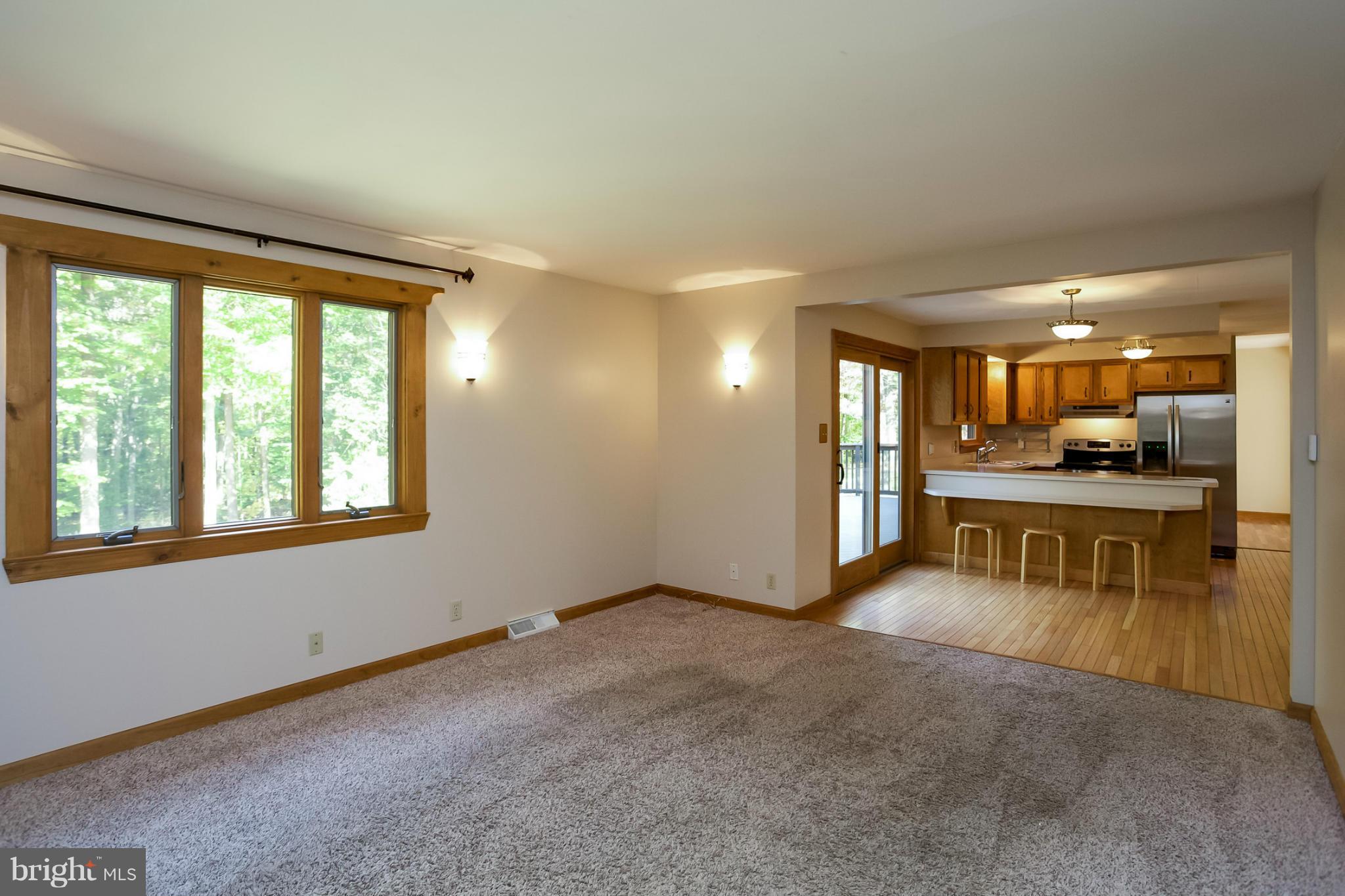 4371 Telegraph Road Elkton, MD 21921 - Photo 10 of 30 a view of an empty room with kitchen and a window