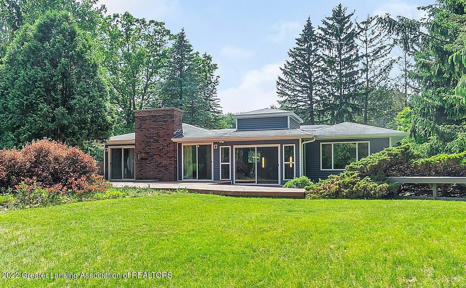5080 Meridian Road Williamston, MI 48895 - Photo 1 of 32 5080 Meridian Road - from rear