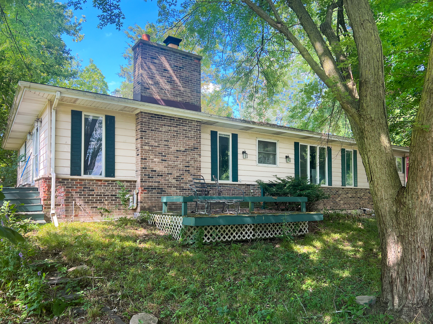 28506 Brickville Road Sycamore, IL 60178 - Photo 1 of 7 front view of house with a yard