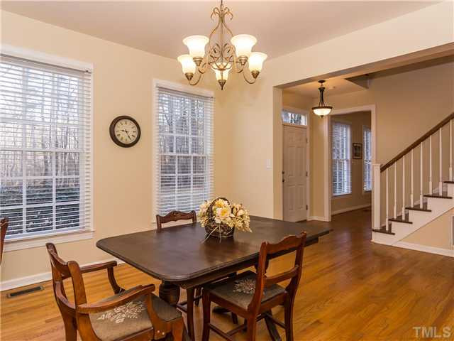 596 Eagle Point Road Pittsboro, NC 27312 - Photo 6 of 25 The dining room has hardwood floors and an updated chandelier. Imagine making memories as you host dinner parties and holiday meals in this inviting space! Dining Room