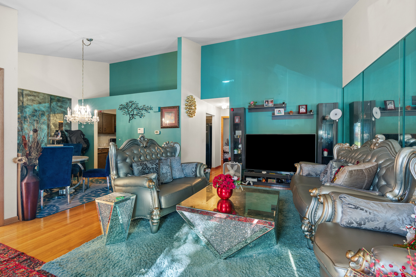 532 East Devon Avenue Roselle, IL 60172 - Photo 3 of 32 a living room with furniture a flat screen tv and a fireplace