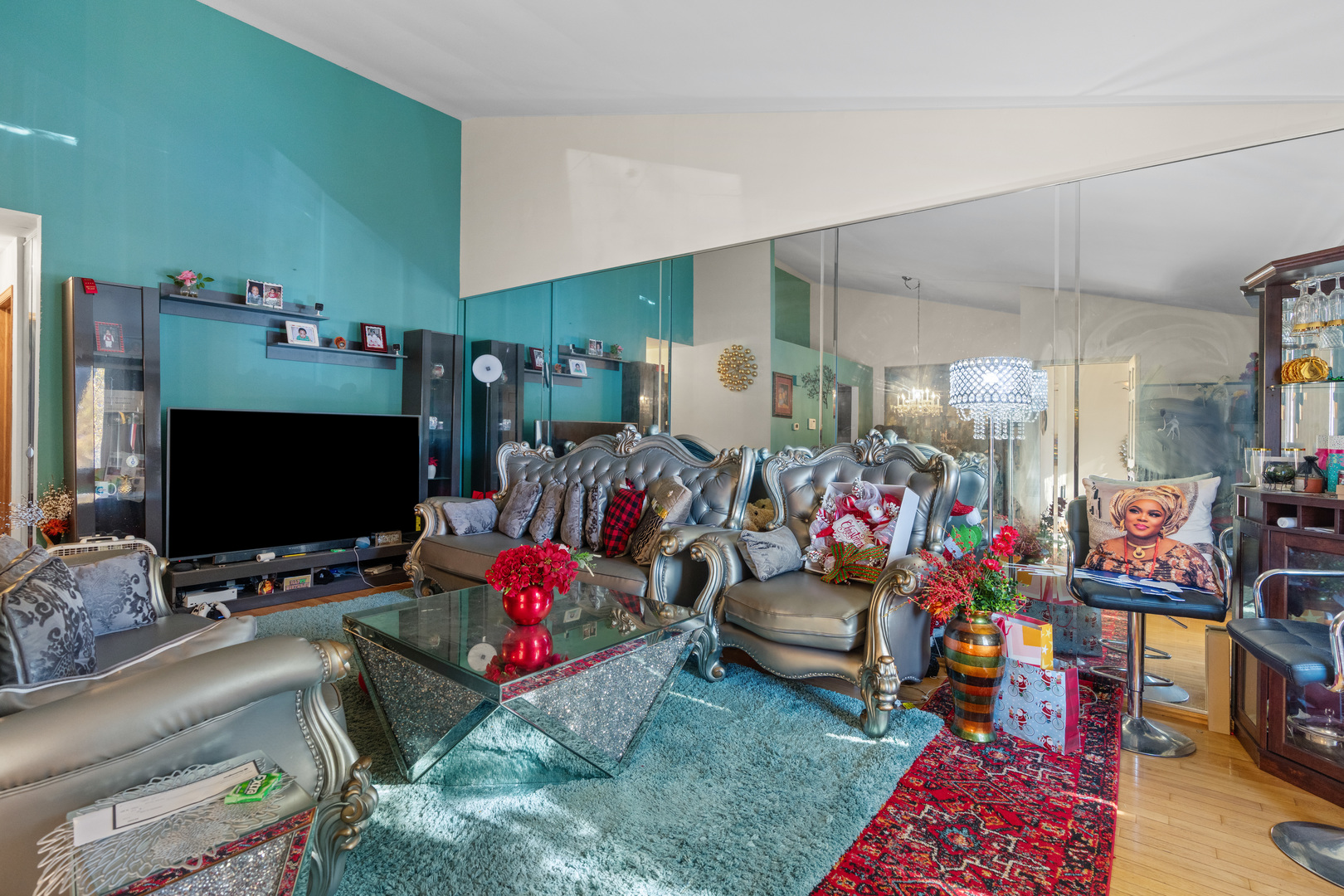 532 East Devon Avenue Roselle, IL 60172 - Photo 4 of 32 a living room with lots of furniture and clutter