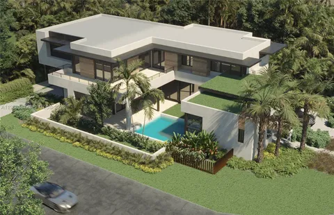 an aerial view of a house with a garden